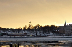 Shiny lights on icy water 